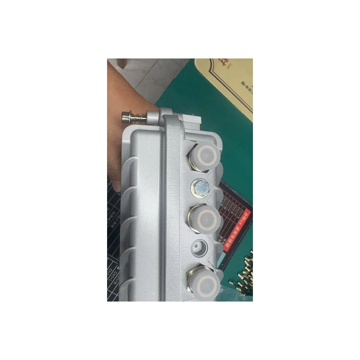 Four N-type female antenna connector ports on top panel of Modem Boost™ outdoor WiFi extender